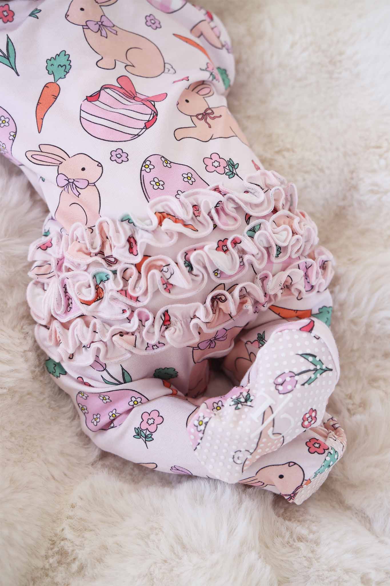 Hoppy Spring Ruffle Zipper Footie | Pink